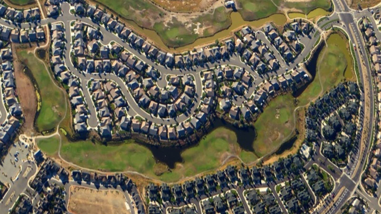 Aerial view of Sparks Nevada neighborhoods with Sierra Nevada mountains in the background — top neighborhoods guide 2026