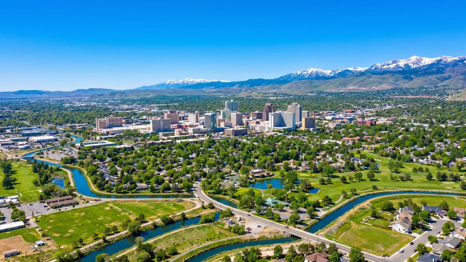 Modern single-family homes in a South Reno master-planned community with the Sierra Nevada in the background