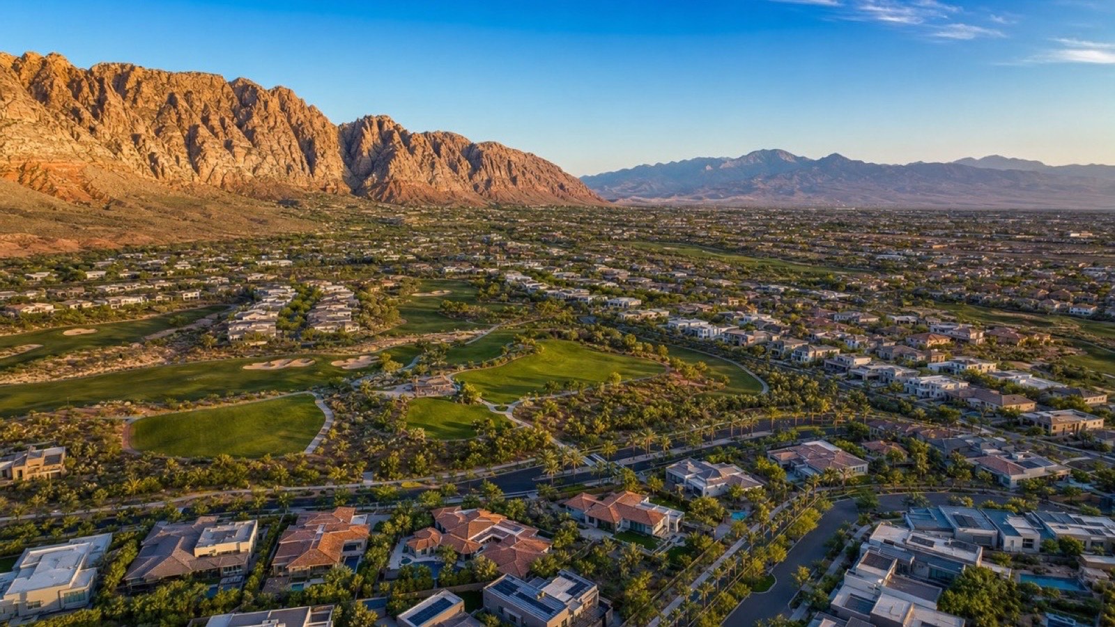 Summerlin Las Vegas master planned community aerial with Red Rock Canyon backdrop — technology and professional services workers choosing western valley suburbs