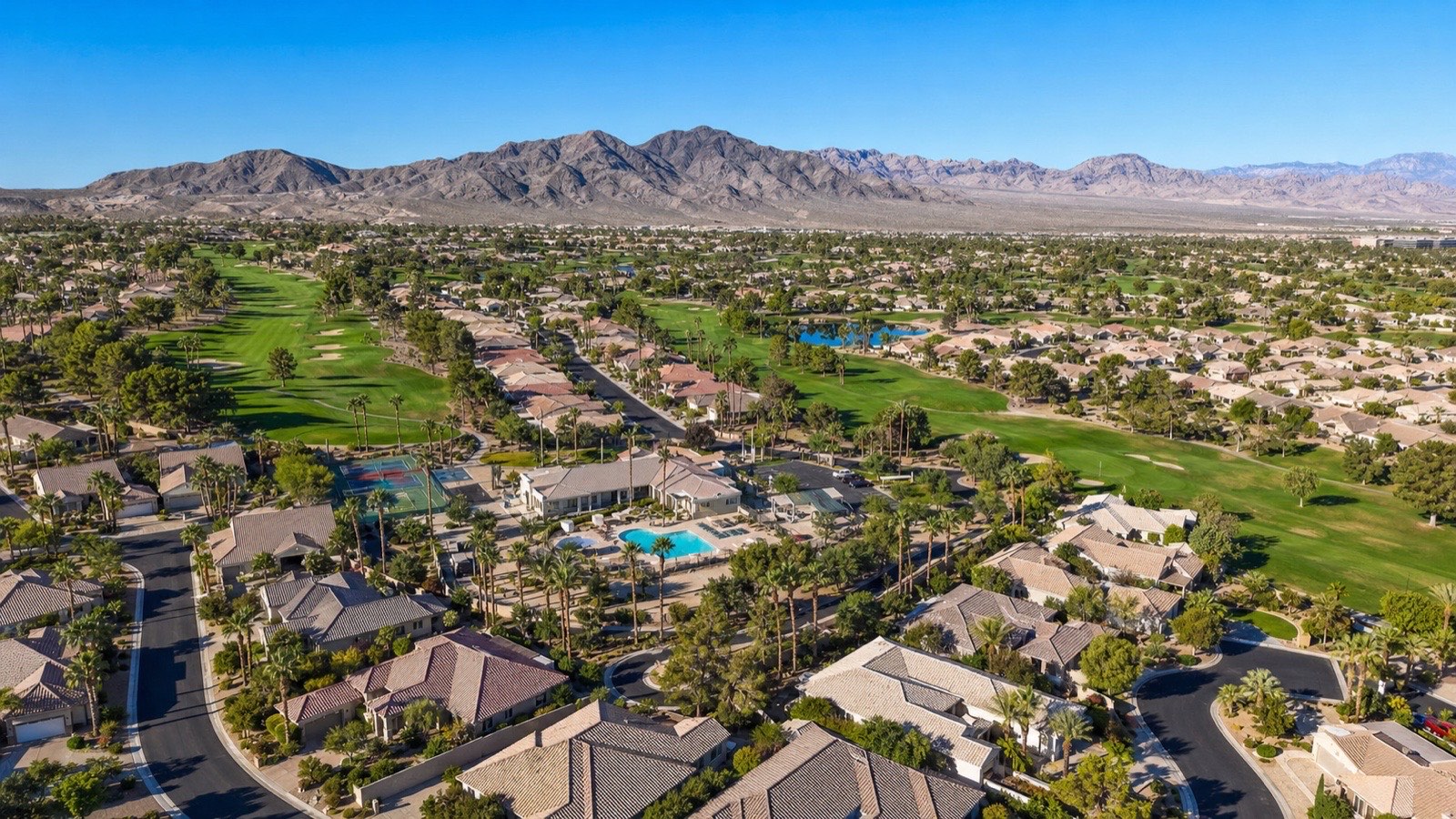 Aerial of the Las Vegas valley at golden hour, one of two Southwest desert markets relocating buyers compare against St. George, Utah